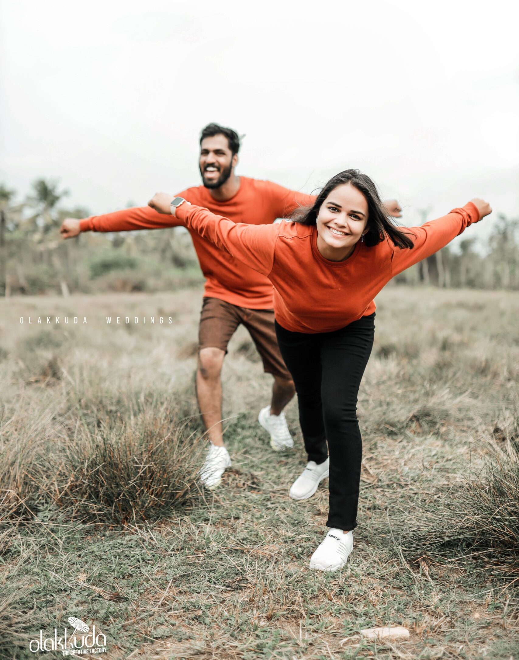 couples posing like flying